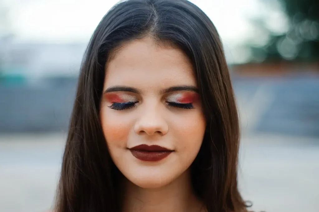 women with makeup and false eyelashes