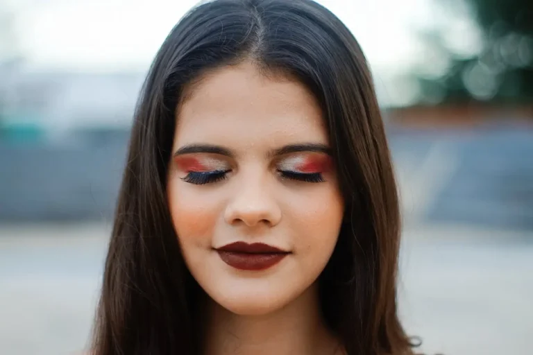 women with makeup and false eyelashes