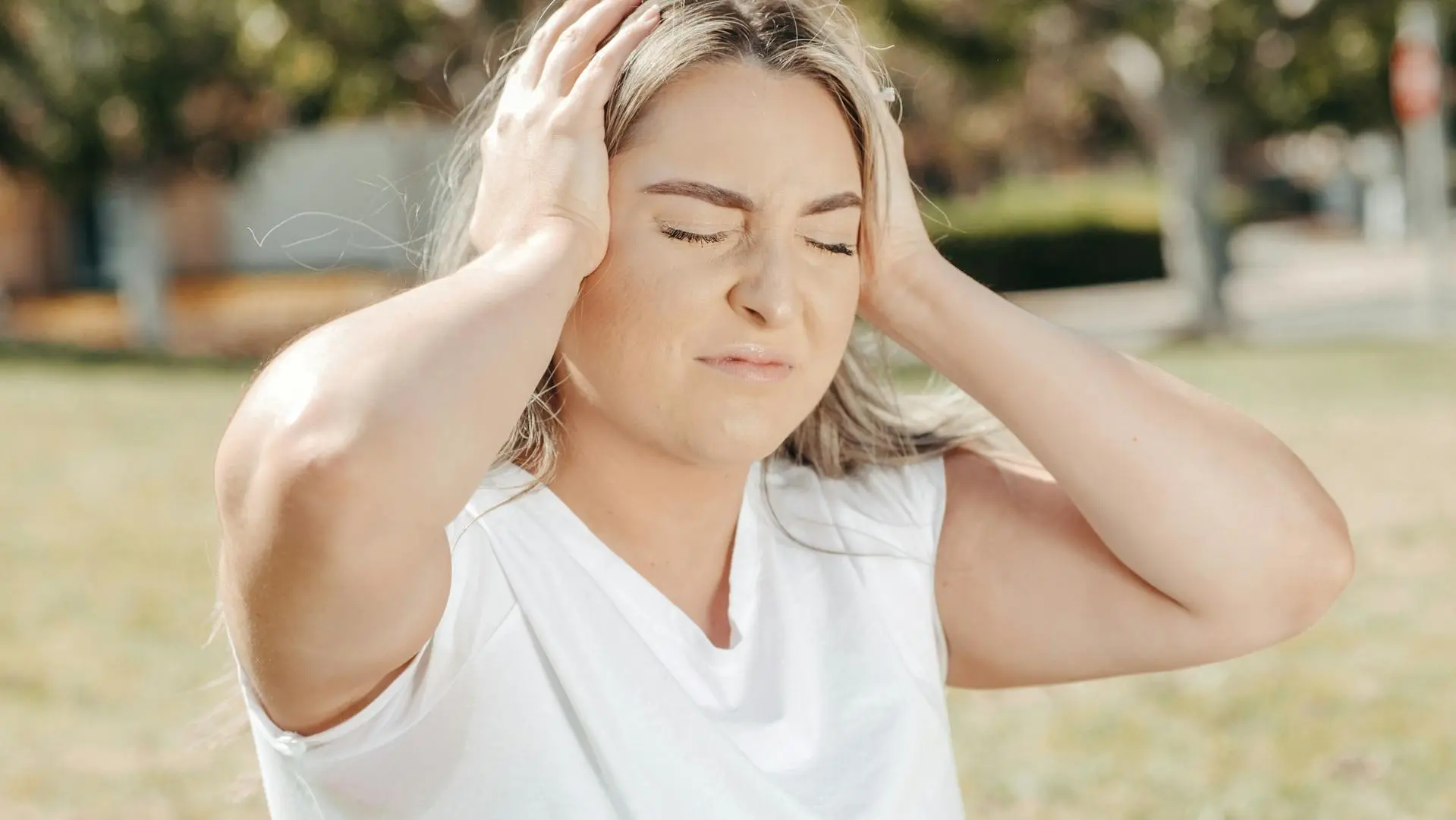 Woman looking tired but hopeful, symbolizing the disconnect between normal thyroid tests and real symptoms